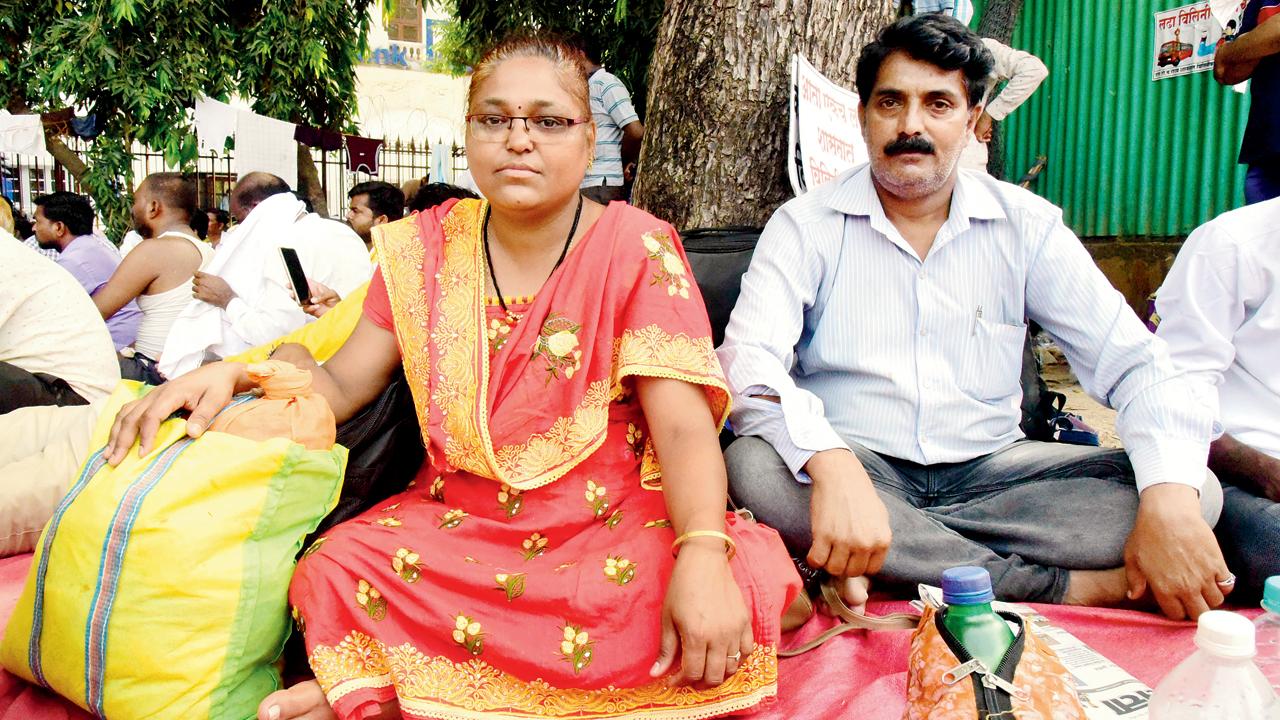 Shruti Swarup Mirazkar, who works in the Shirala depot in the Sangli division, with her husband Swarup, is the only woman conductor from the depot to have joined the protest