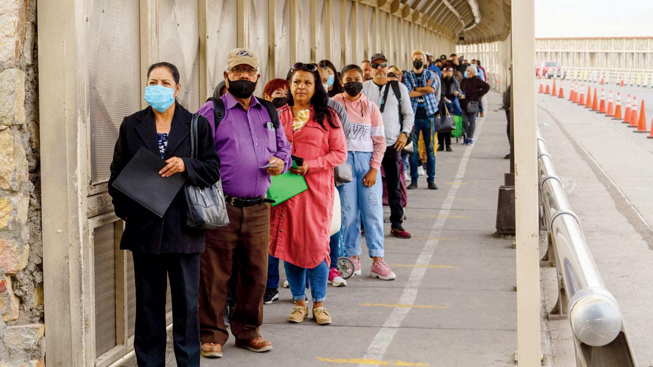 People wait in line to clear customs and enter the US at the Paso Del Norte Port of Entry in downtown El Paso, Texas, on November 8. Pic/AFP