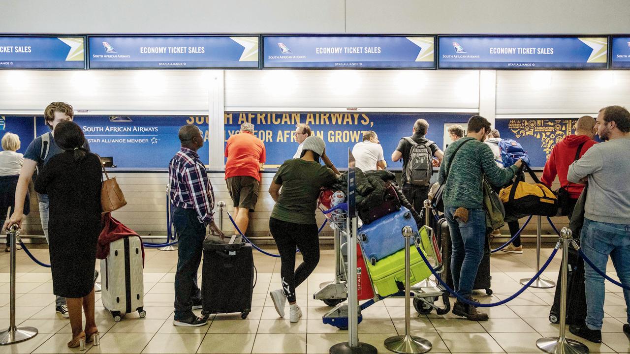 Passengers at the O.R. Tambo International Airport, Johannesburg, in 2019.  France has also suspended arrivals from seven southern African countries
