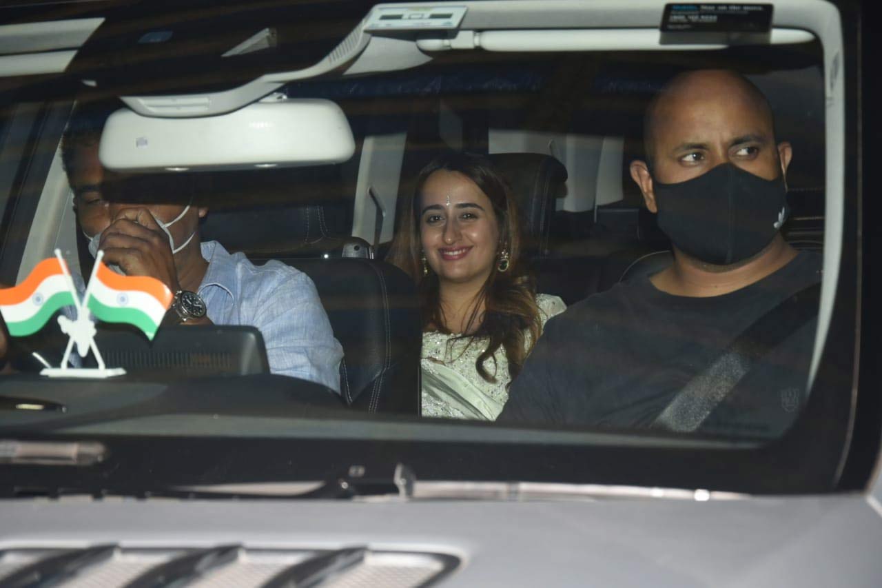 Natasha Dalal was seen flashing her million-dollar smile as she attended Aarti's party along with her hubby Varun.
