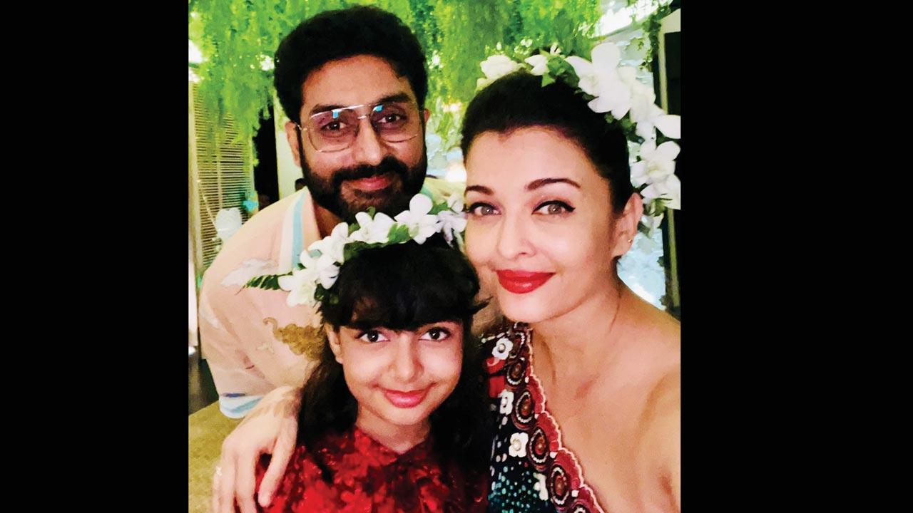 Aishwarya Rai Bachchan  with husband and daughter