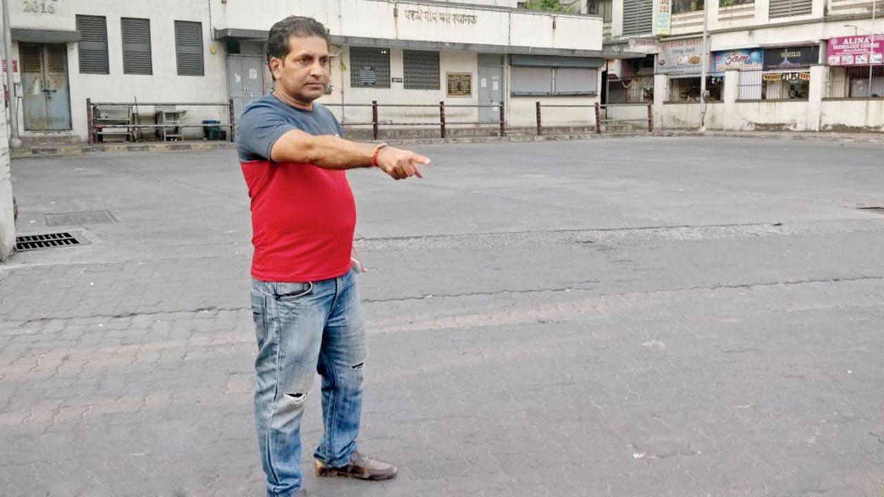 Ganesh Bhikule, the eyewitness, shows the spot where the accident happened killing the teenager, at Worli Village Depot on Friday