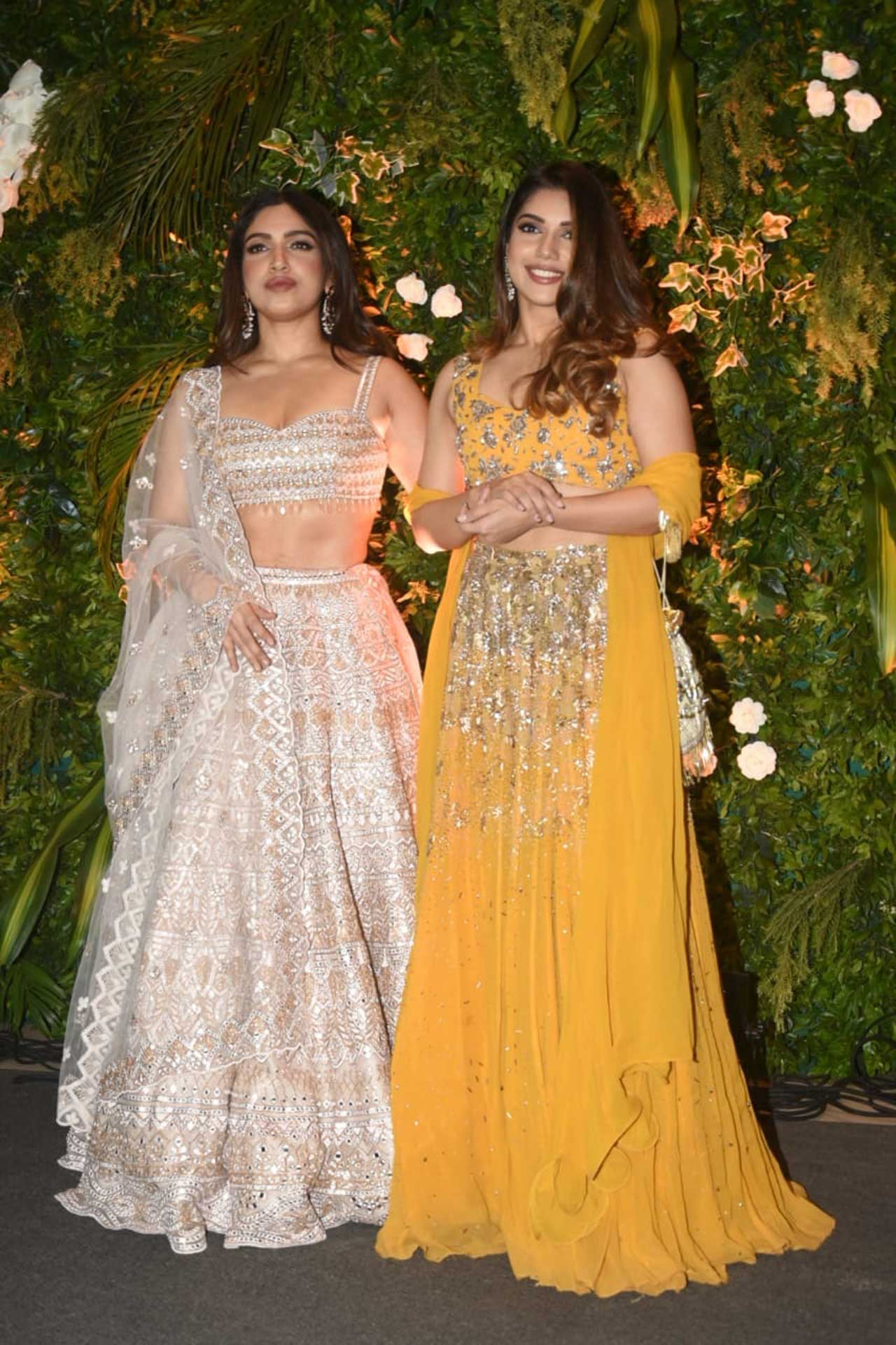 Bhumi was accompanied by sister Samiksha Pednekar who looked pretty in a chrome yellow lehenga choli with silver embellishments.