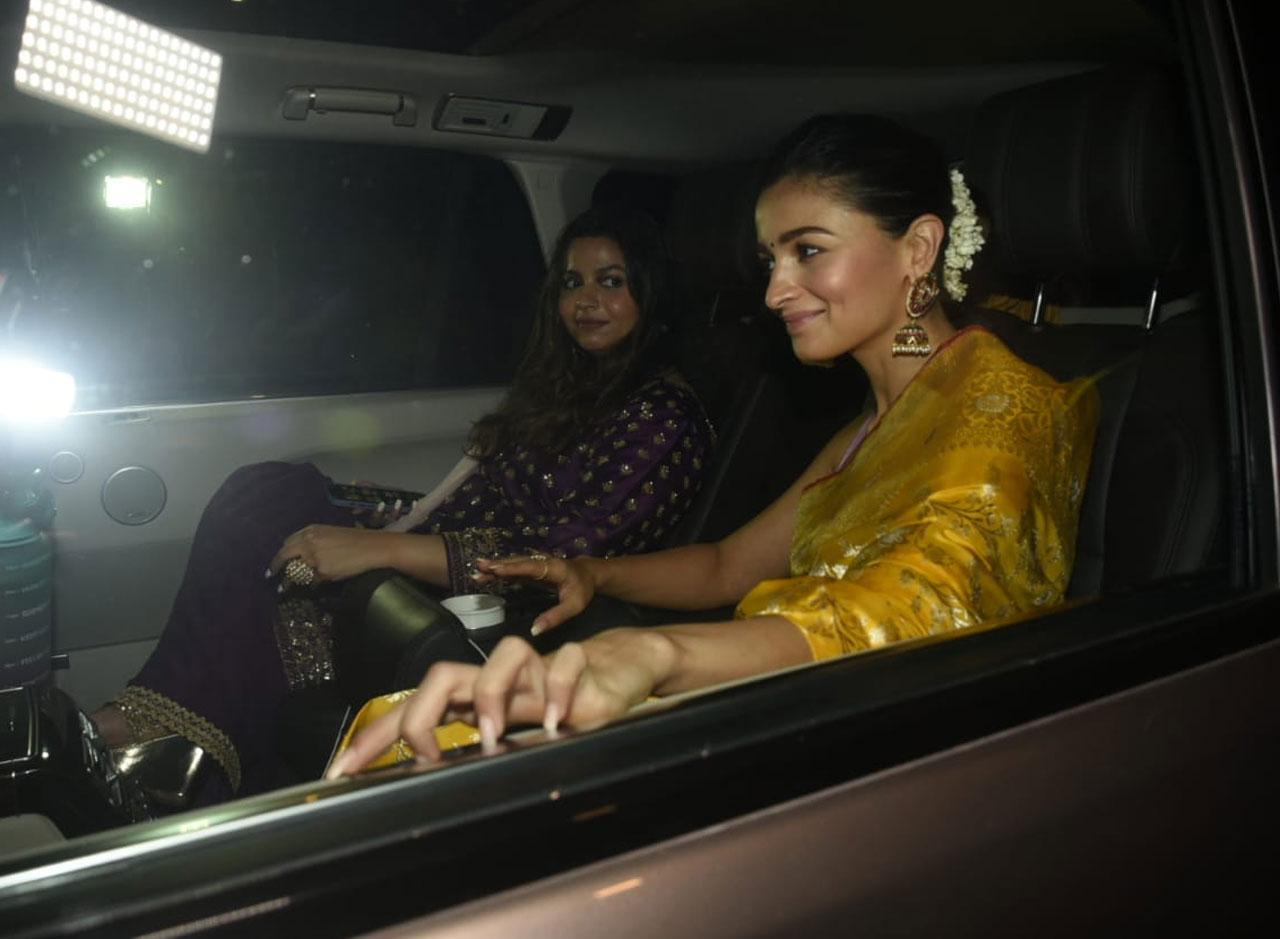 Alia Bhatt and Shaheen Bhatt nailed their outfits as they arrived together at Aditya Seal and Anushka Ranjan's wedding. The Raazi actress was seen arriving in a ravishing Golden Saree and she completely nailed her traditional look.