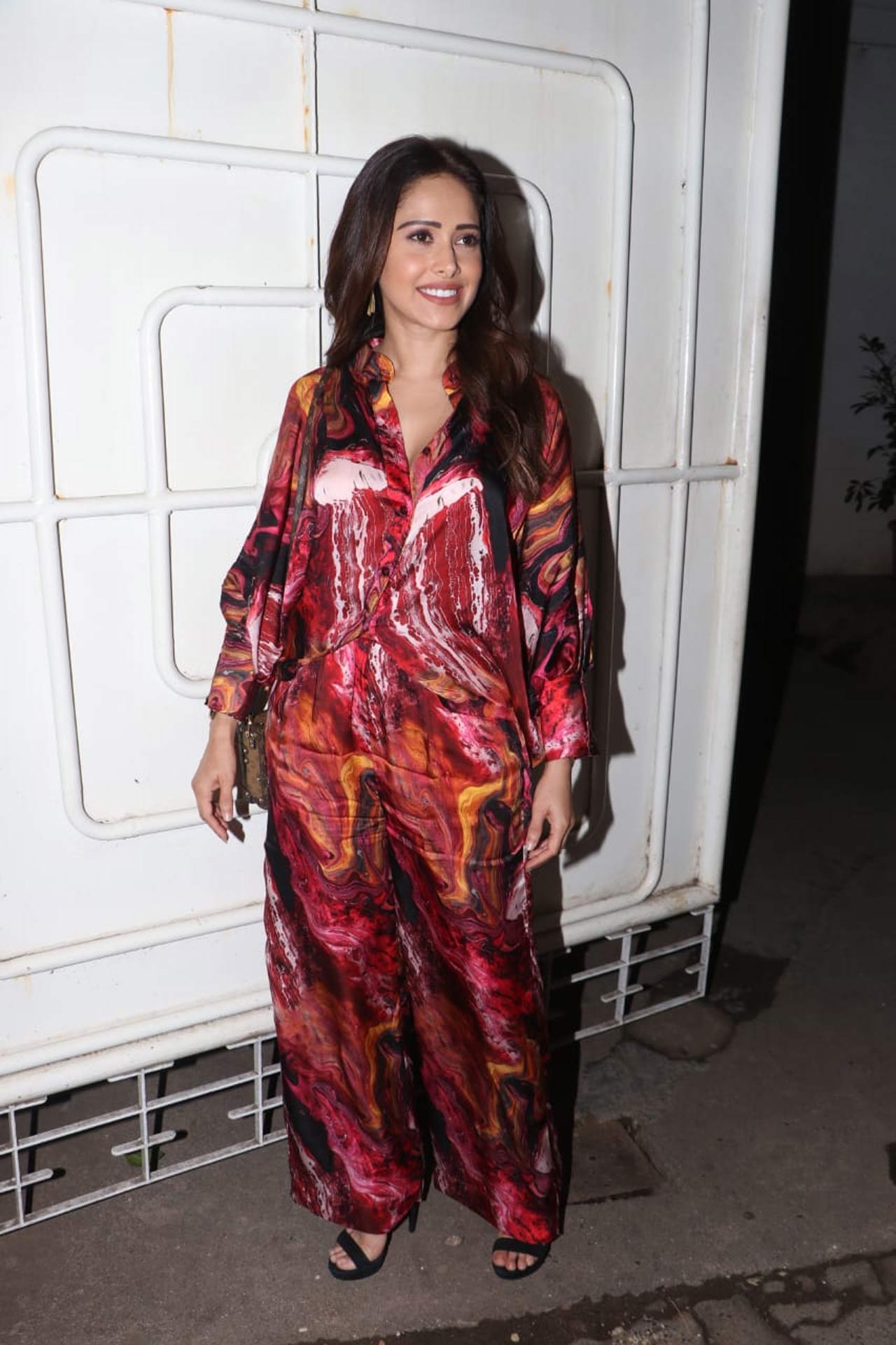 Nushrratt Bharuccha was snapped wearing a satin co-ord set as she attended the special screening of Chhorii, hosted a popular studio in Juhu, Mumbai. Chhorii premiered on Prime Video on 26 November in India and more than 240 countries and territories worldwide.
 
 