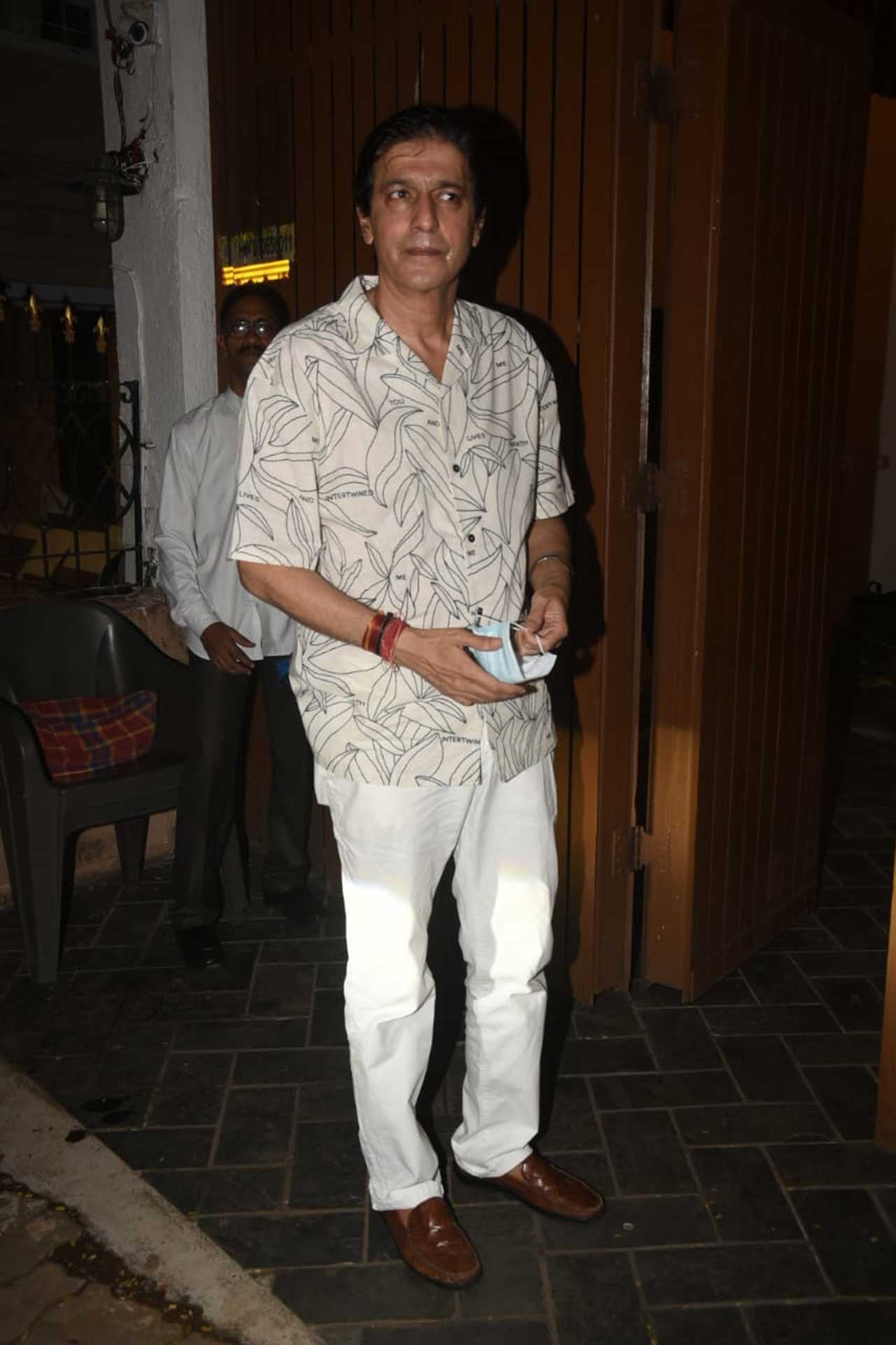 Alanna's uncle Chunky Panday was seen arriving at the party venue in a casual white printed shirt and white pants.