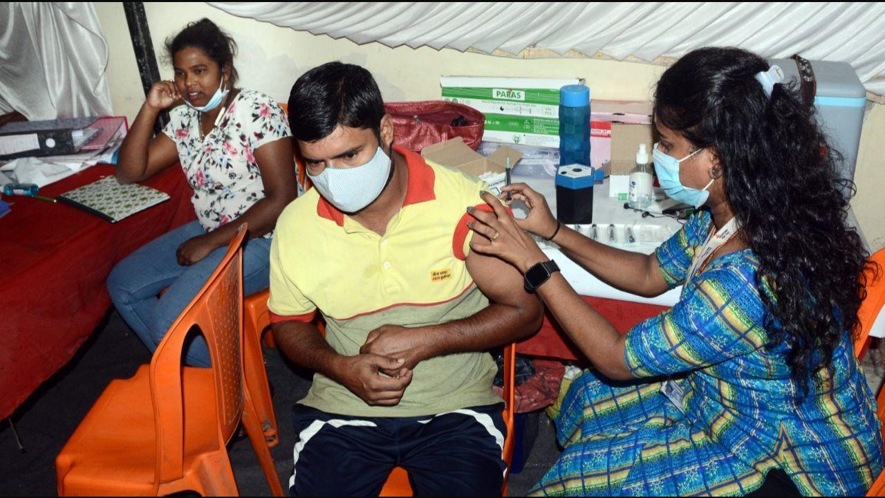 A beneficiary getting vaccinated at a hospital in Mumbai. Pic/Sameer Abedi