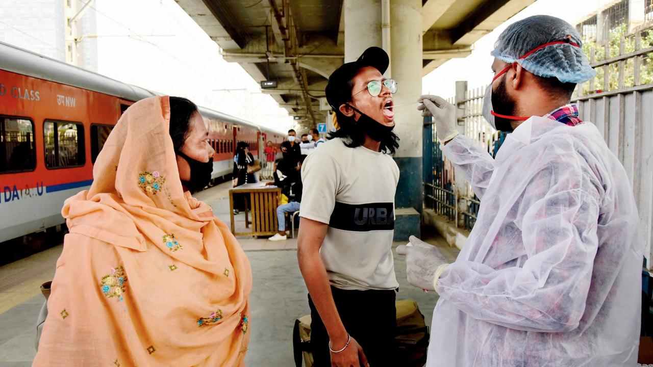 A passenger undergoes a COVID test at Dadar station on November 13. File pic
