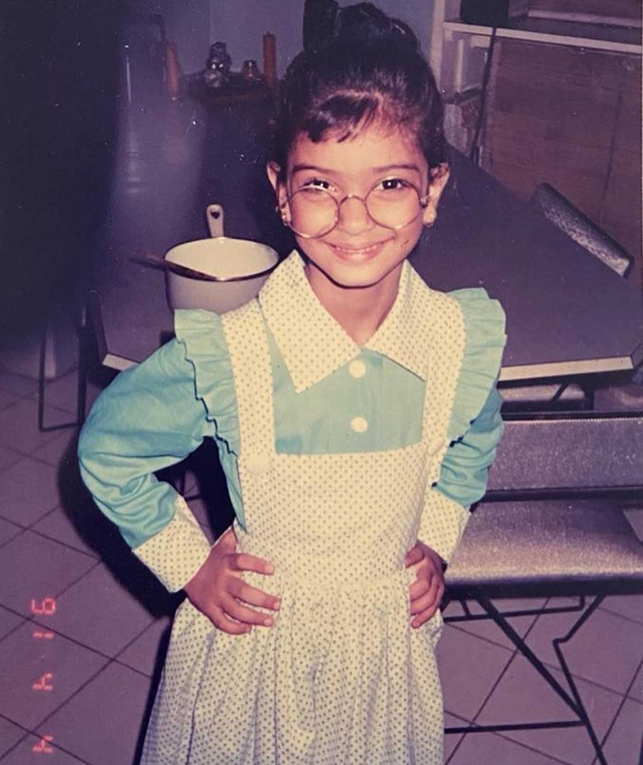 Diana Penty shared a super cute, nerdy picture of her childhood days, in which she can be seen dressed in a blue and white dress with frills and polka dots. 
