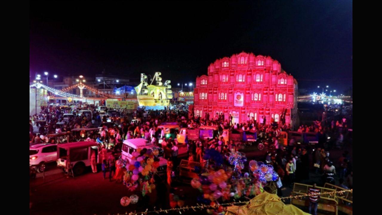 Illuminated walled city market and Hawa Mahal on the occasion of Diwali festival, in Jaipur.