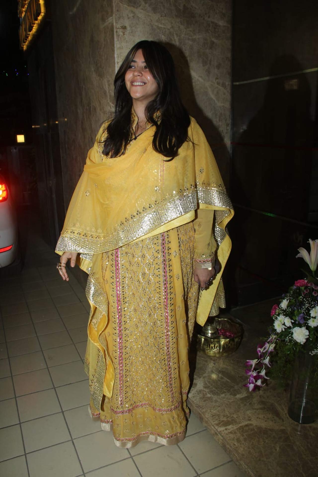 Ekta Kapoor was all smiles as she posed for paparazzi at Ramesh Taurani's Diwali bash. Her yellow ethnic outfit looked like the perfect choice for this Diwali party.