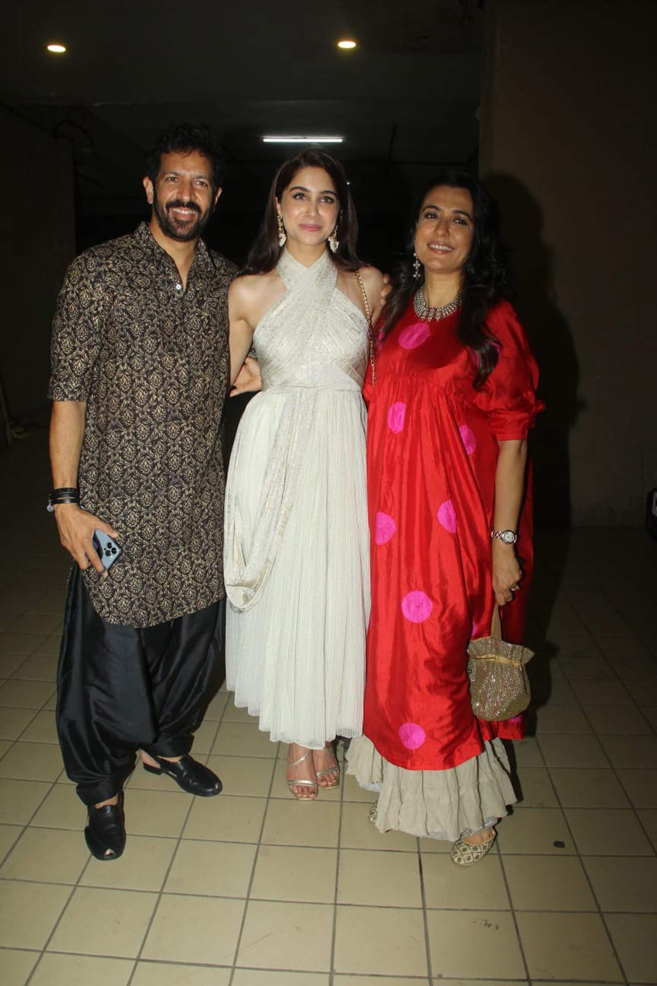 Bunty Aur Babli 2 fame Sharvari Wagh was a vision in white as she attended the party in a classy outfit. The actress posed with director Kabir Khan and his wife Mini Mathur, a well-known TV host and VJ.