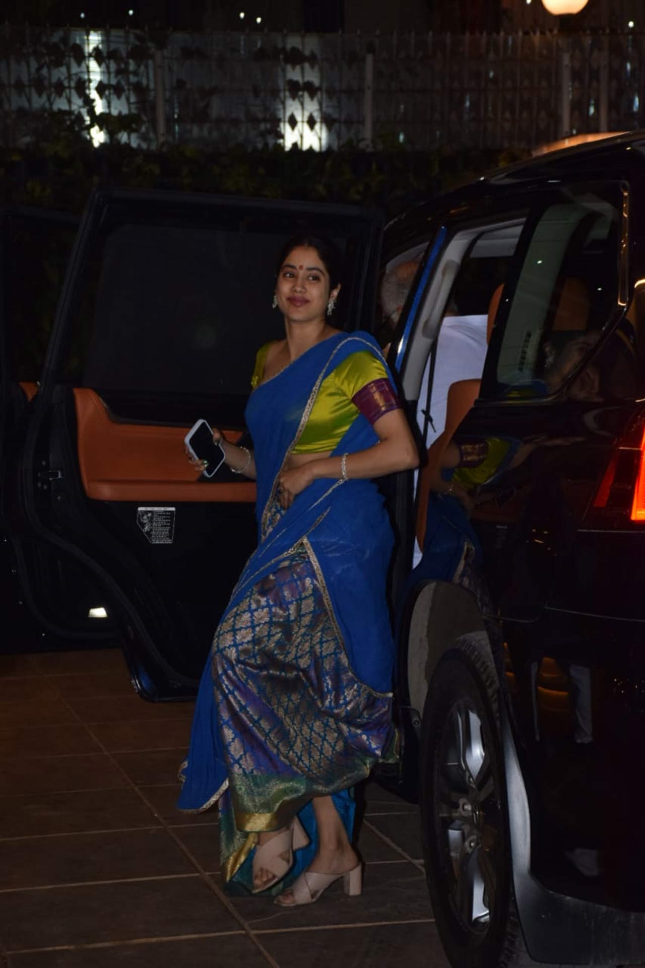 Janhvi Kapoor dressed up in a pretty south Indian attire as she attended Diwali puja at her father Boney Kapoor's office in Juhu. She paired her lime green blouse with a Kanjeevaram skirt and blue dupatta for the celebration.