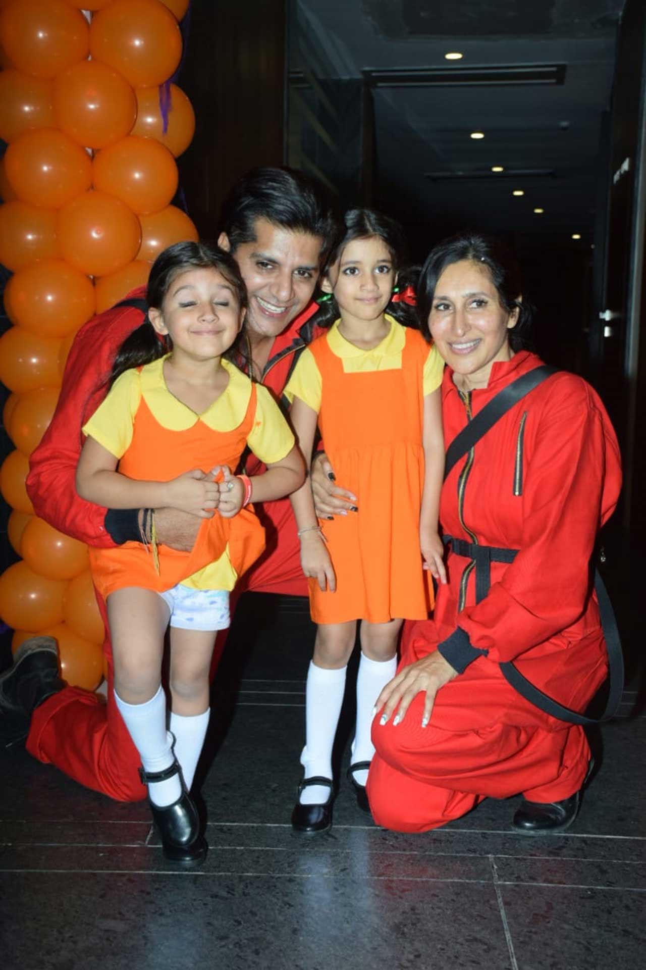 Karanvir Bohra and Teejay Sidhu's twin daughters Bella and Vienna turned 5 in October. The proud parents hosted a unique birthday bash for the kids. The theme of the party was Squid Game, Netflix's most popular Korean drama. Karanvir and Teejay dressed up as the guards while Bella and Vienna dressed up as the doll in Red Light Green Light game.