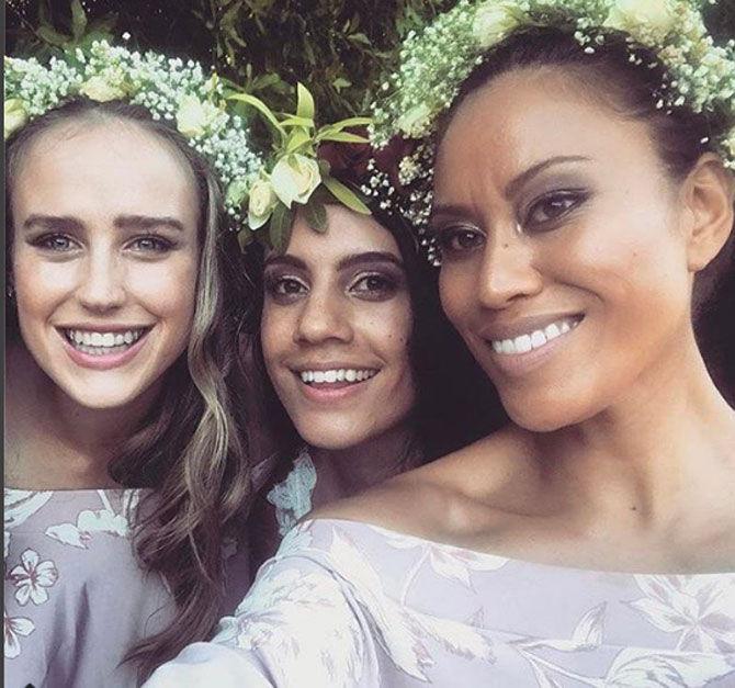 Ellyse Perry posted this picture of hers with a couple of friends at a wedding, captioned, 'Repost from @vtoomua... Very lucky to call these two my sisters! #fromothermister #toomuas'