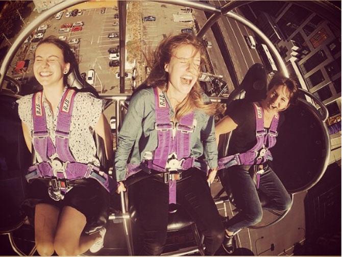 Ellyse Perry seen here enjoying an outing at an amusement park with her friends. Perry wrote, 'Takeoff with @lizefraser and @k8fra! Incidentally, @lizefraser is well worth a follow - takes some amazing travel pics and gosh she is good at cricket. To clarify, that's @lizefraser @lizefraser @lizefraser...'