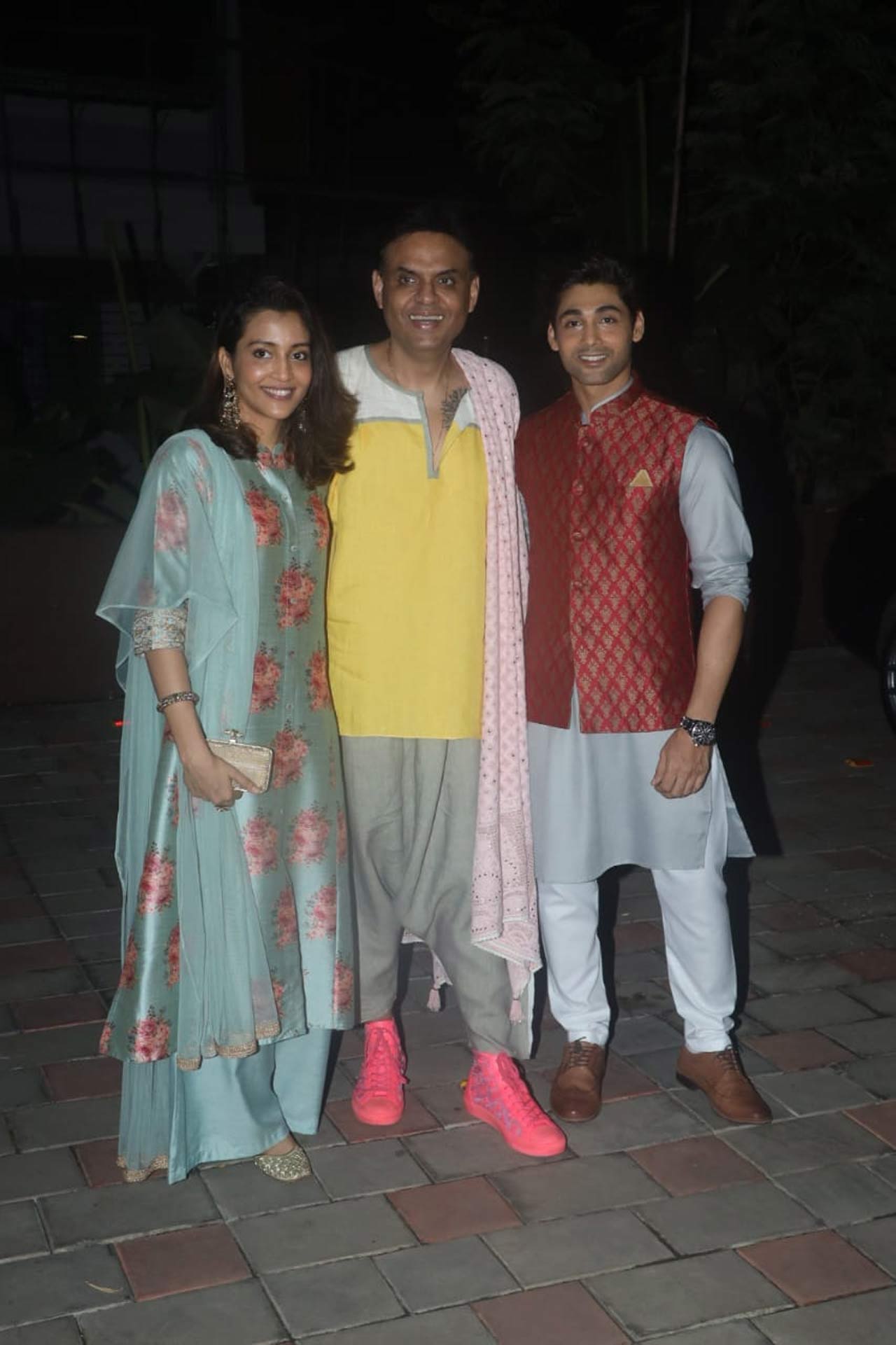 The host of the party Sandiip Sickand himself posed with Ruslan Mumtaz and his wife Nirali Mehta as the couple attended the Diwali party.