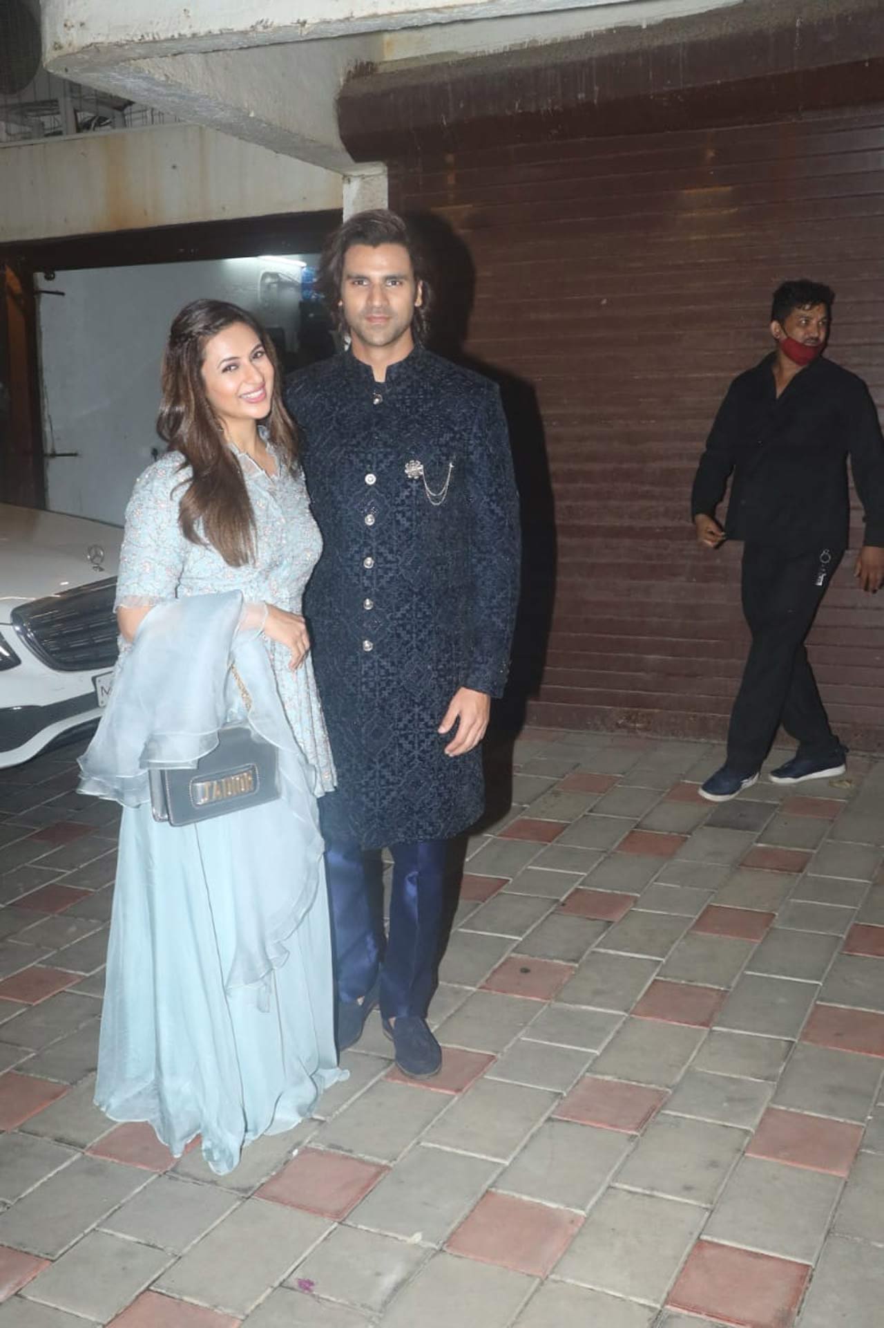 Divyanka Tripathi, along with her hubby Vivek Dahiya attended Sandiip Sickand's Diwali party hosted at his Juhu residence. The actress opted for a powder blue lehenga, whereas Vivek was snapped wearing a navy blue sherwani.