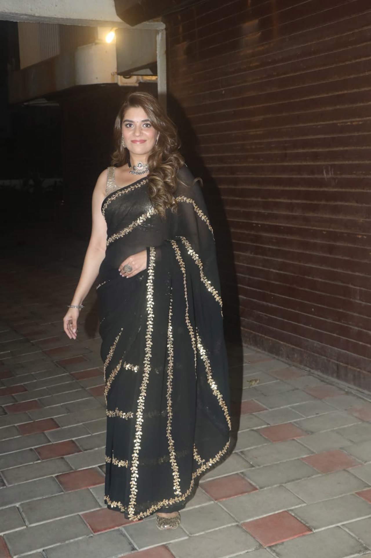 Pooja Gor's sartorial choice was appreciated by many fashionistas. She draped a black and golden six-yard as she attended popular producer and director Sandiip Sickand's Diwali bash.