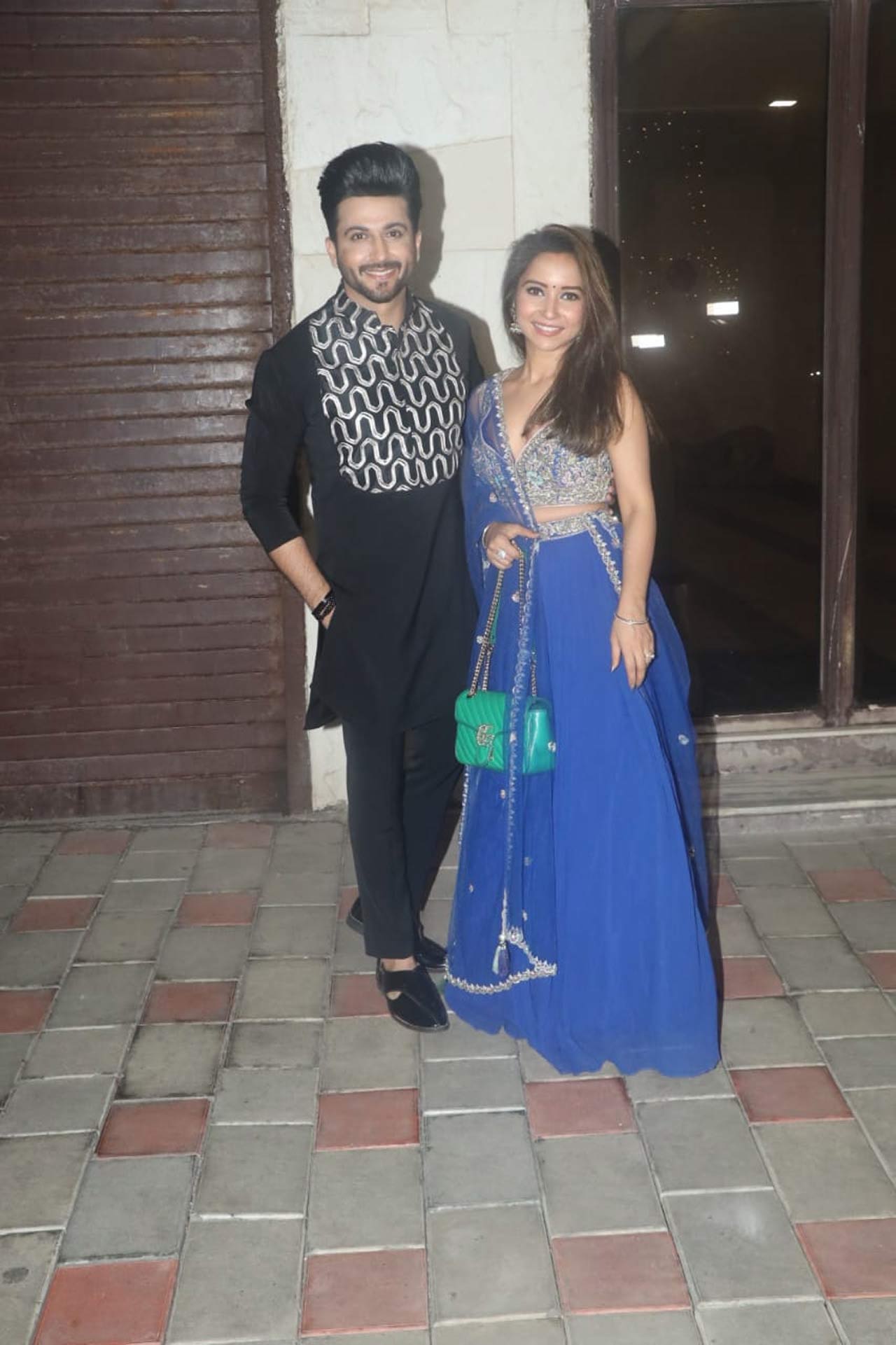 Popular TV couple Dheeraj Dhoopar along with wife Vinny Arora, posed for the shutterbugs as they arrived for the Diwali bash. While Dheeraj was seen donning a black kurta pyjama, Vinny upped the fashion game in a blue coloured lehenga.
