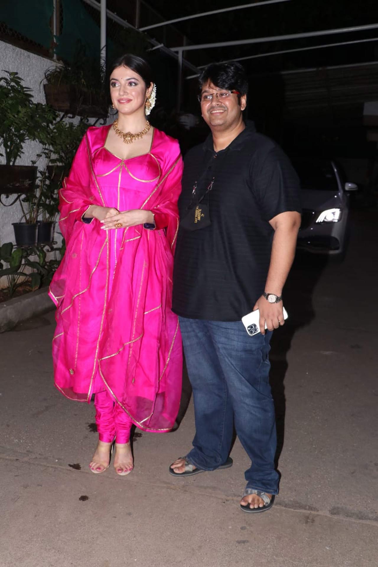 Divya Khosla Kumar posed with the director of the film Milap Zaveri. The actress is all set to share screen space with John Abraham for the very first time. Divya's Fuschia pink Anarkali outfit has been loved by a lot of fashionistas on social media. What do you guys think?