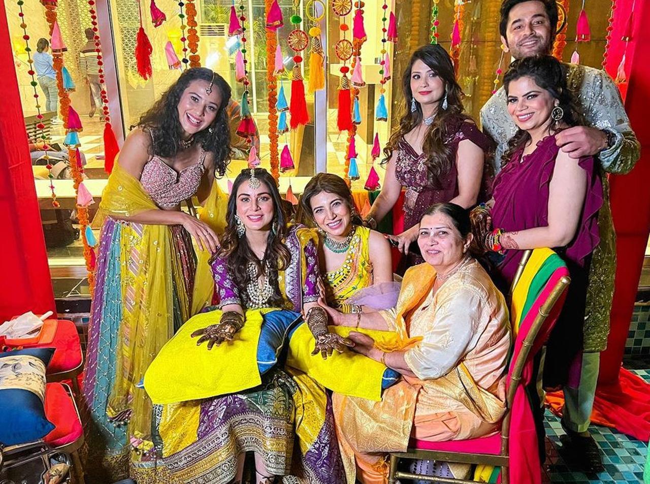 Shraddha Arya indeed loooked like one happpy bride as she posed with family on her Mehendi ceremony. The television actress' friends, who will be soon flying from the city to Delhi, have already started posting fun videos and pictures on Instagram. 