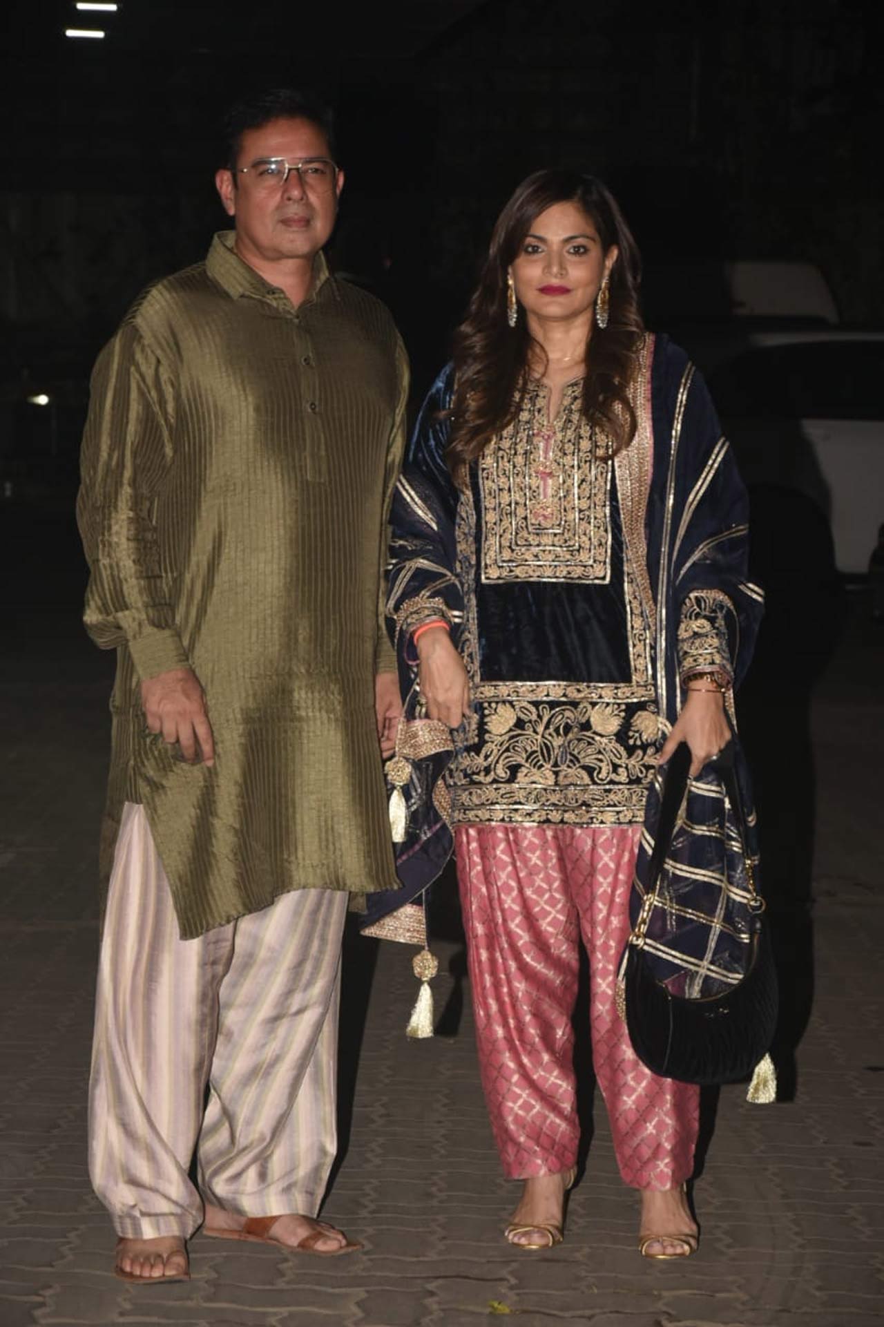 Atul Agnihotri and his wife Alvira Khan Agnihotri posed for the shutterbugs as they attended Sohail Khan's Diwali party. Alvira looked pretty in a velvet ethnic outfit, whereas former actor Atul was seen wearing a classy silk kurta.