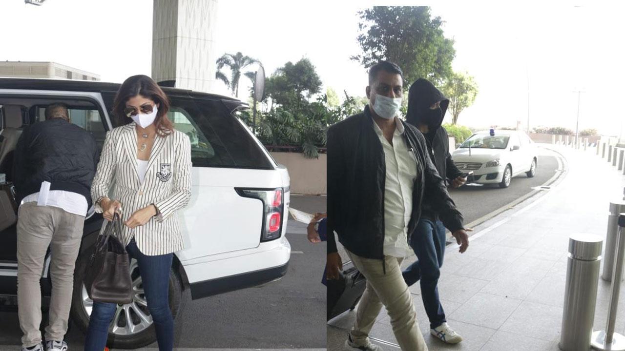 Shilpa Shetty and Raj Kundra were spotted together again by the media and this time at the Mumbai airport. The businessman opted for a black  jacket with a hoodie whereas the actress impressed yet again with her choice of outfit. Click here to see full gallery