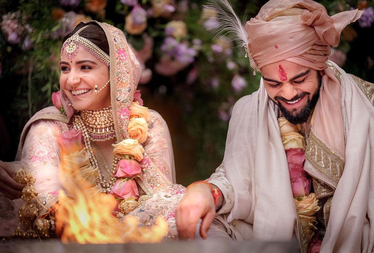 Virat Kohli and Anushka Sharma tied the knot on December 11, 2017 at an extremely private and intimate ceremony in Italy at the Borgo Finocchieto, a village turned villa. The bride and the groom, both carried Sabyasachi outfits with elan. If Kohli nailed his Sherwani, Sharma looked nothing less than spectacular in her pastel pink lehenga accompanied by pearls and beads. They even shared a gorgeous picture with fans on their social media accounts. (Picture Courtesy: Official Instagram Account- Anushka Sharma)