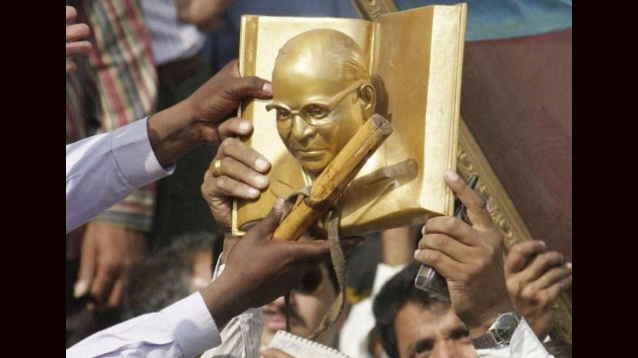 On October 14, 1956, Dr Bhimrao Ramji Ambedkar renounced Hinduism and converted to Buddhism along with nearly 4, 00,000 of his followers in a public ceremony at Deekshabhoomi in Maharashtra’s Nagpur district. The day is celebrated as Dhammachakra Pravartan Din or the liberation day by the followers of Buddhism and Dr Ambedkar across the country. This picture is from New Delhi where a sculpture of Dr Ambedkar is moved to the stage ahead of a mass conversion ceremony on November 4, 2001. Photo: AFP.