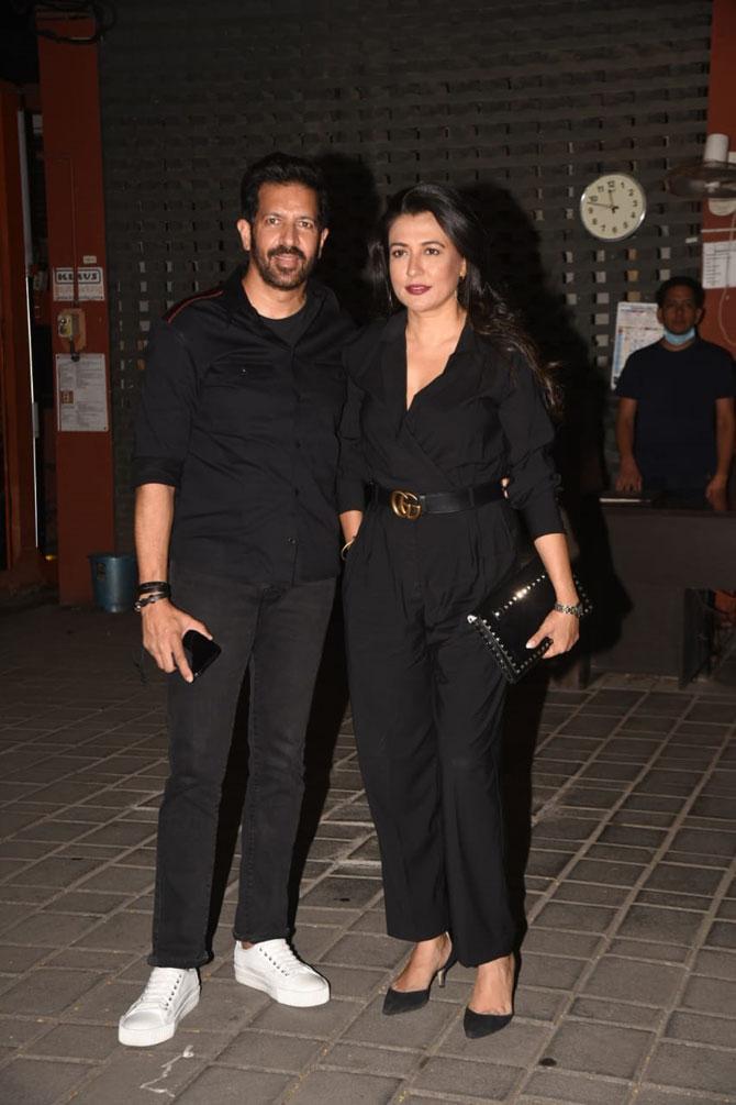 Filmmaker Kabir Khan was snapped with wife actress Mini Mathur at Aayush Sharma-Arpita Khan's residence for the party. Mini looked stunning in a black shirt paired with black trousers.