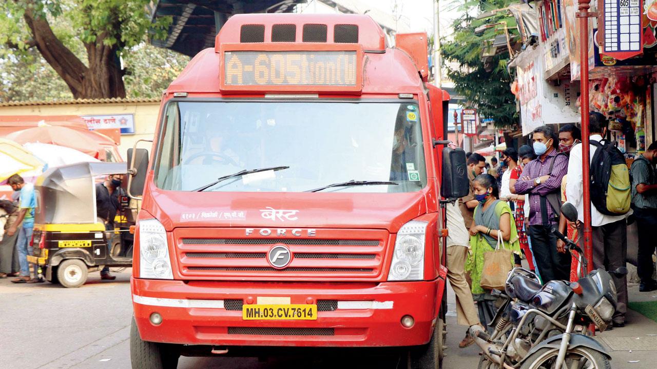 Commuters board a bus at Bhandup. Pic/Rajesh Gupta