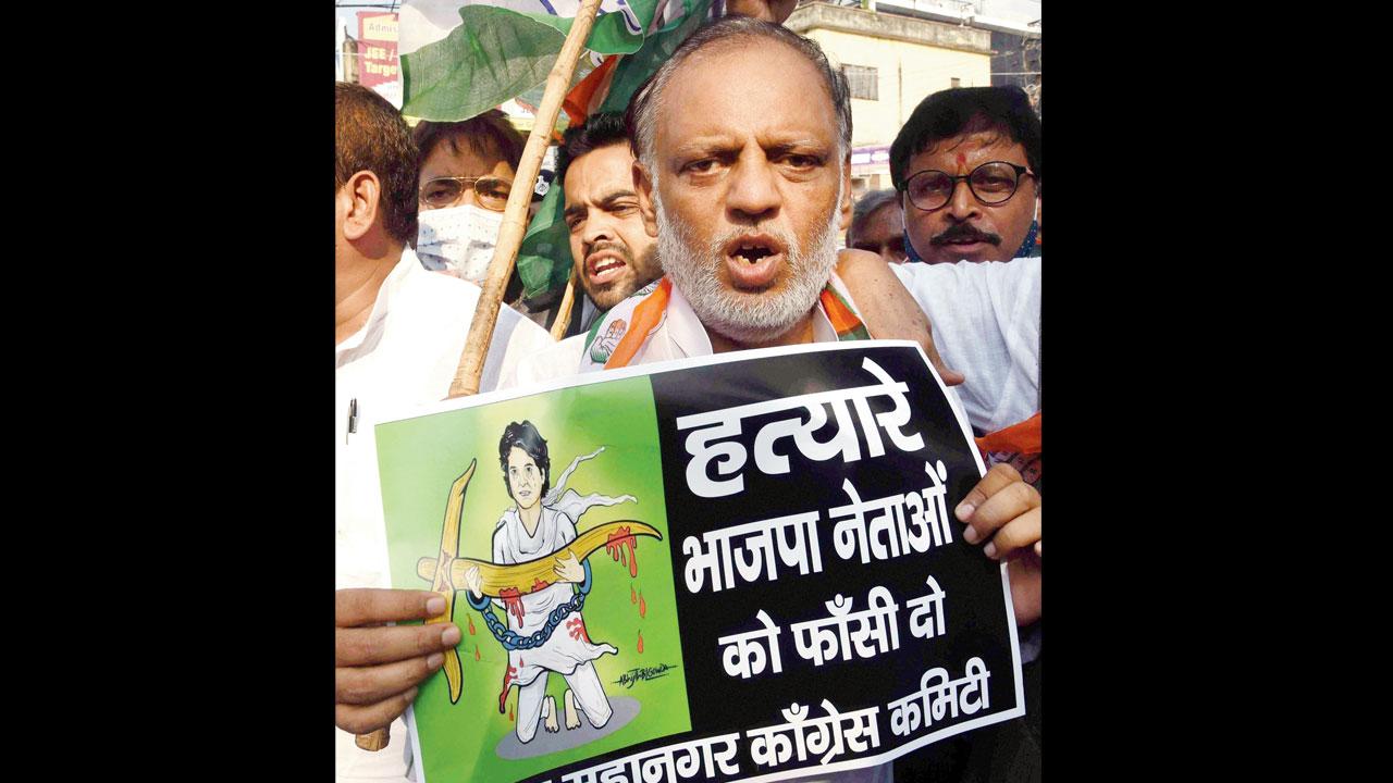 Congress activists protest in Patna on Tuesday. Pic/PTI