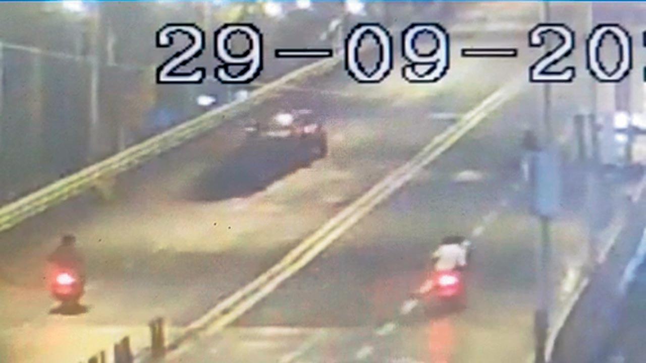 Grabs of the CCTV footage retrieved from the spot show the bike skidding off the road after the collision and the car driving off