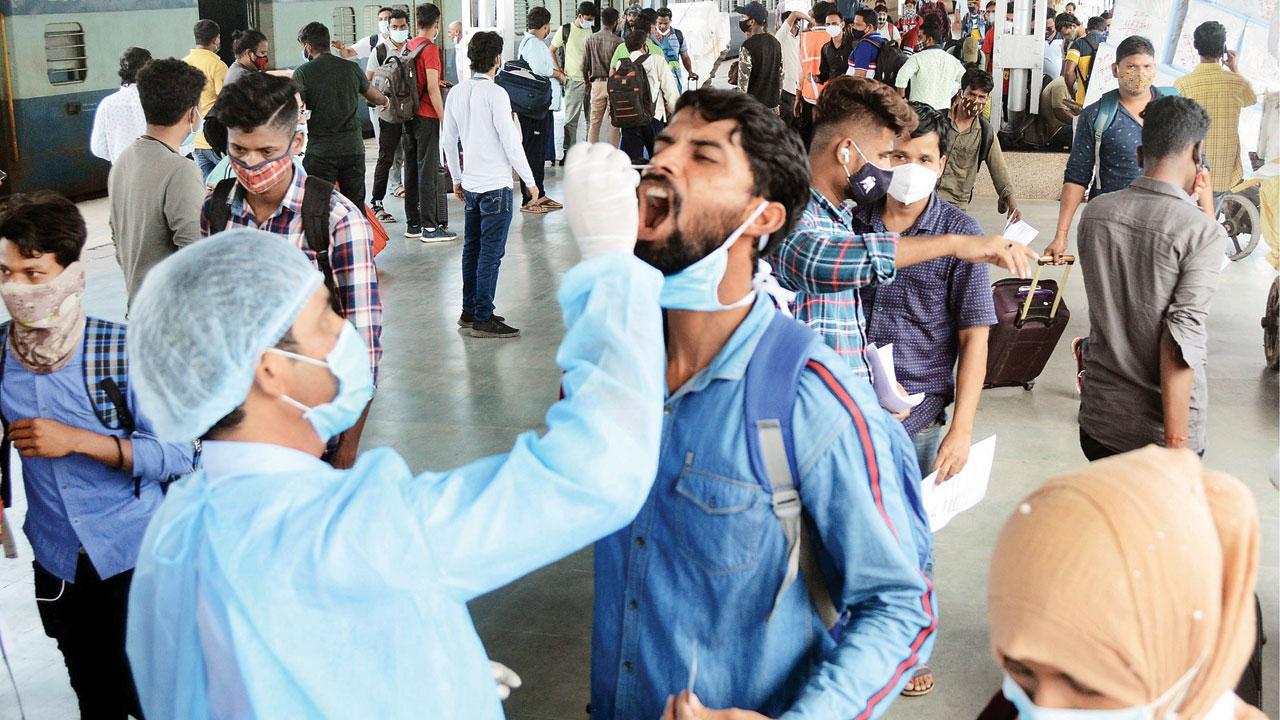 Antigen tests being conducted at the Lokmanya Tilak Terminus on Wednesday. Pic/Sayyed Sameer Abedi