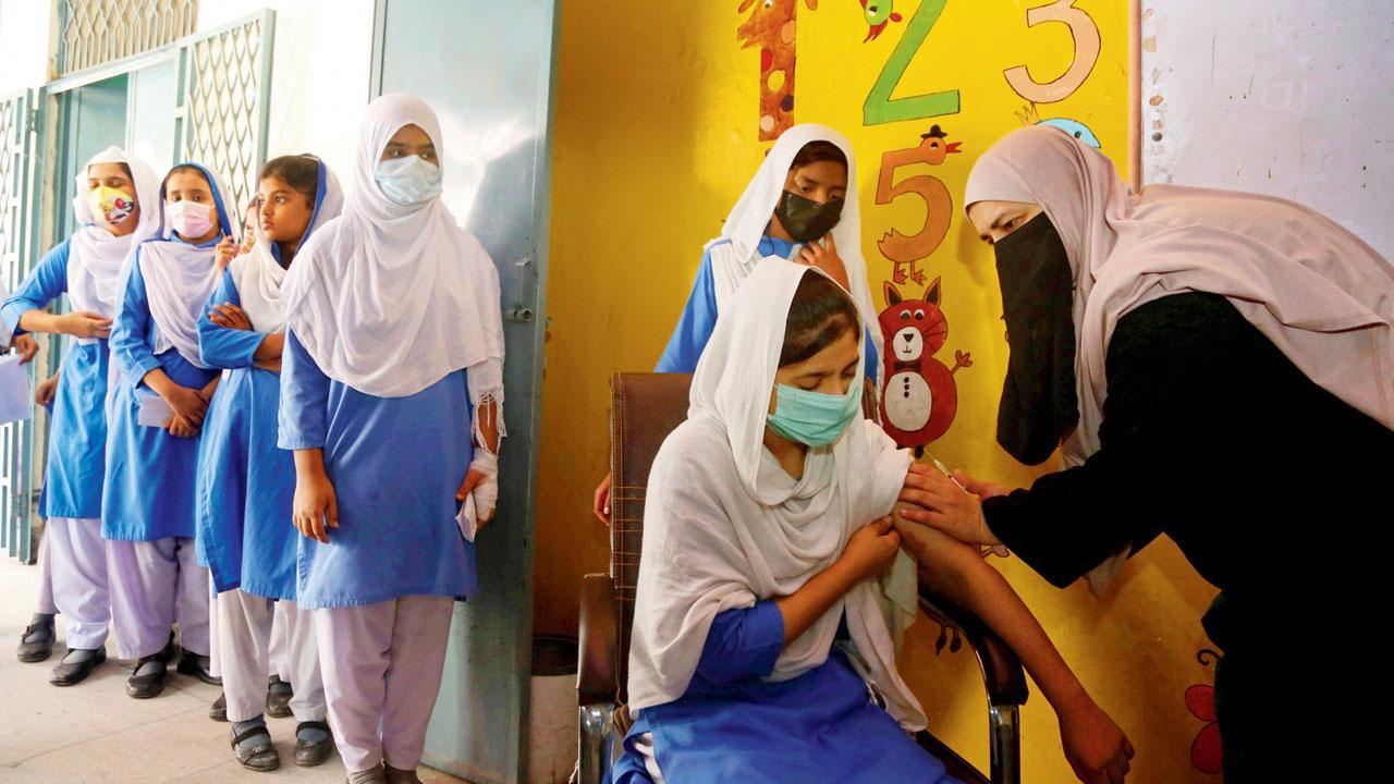 Two Pfizer shots 90 per cent effective against hospitalisation: Study