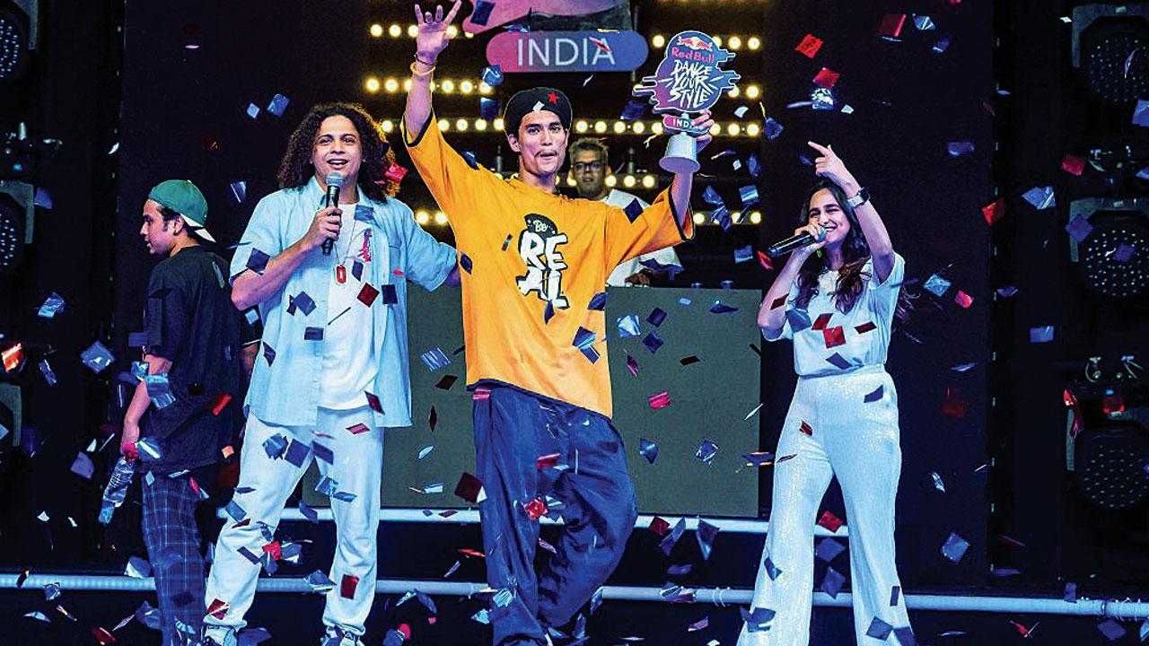 Deepak Sahi (in yellow) celebrates his win at the Dance Your Style contest