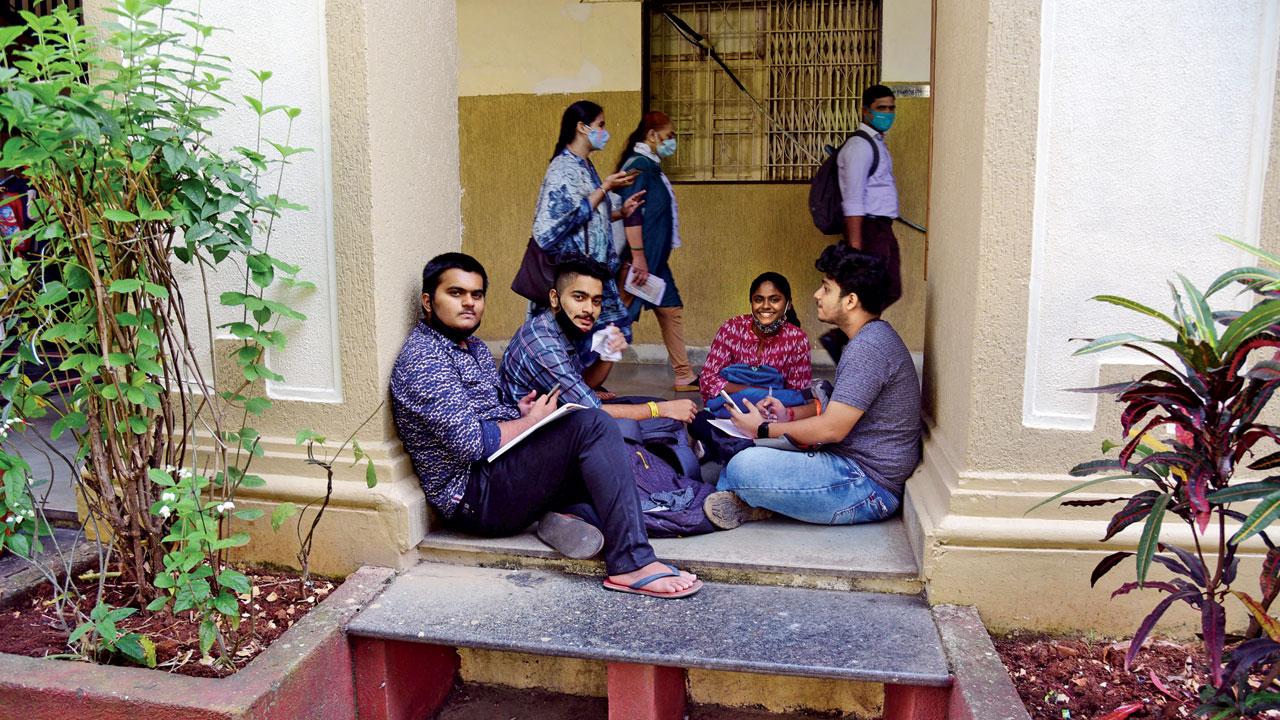 Students are back on campus after almost 19 months, at Guru Nanak Khalsa College in Matunga, on Wednesday