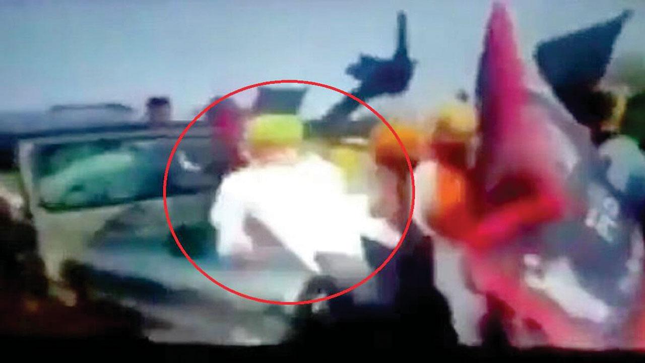 Screengrab shows a farmer being hit by an SUV at Lakhimpur Kheri district of UP on Sunday