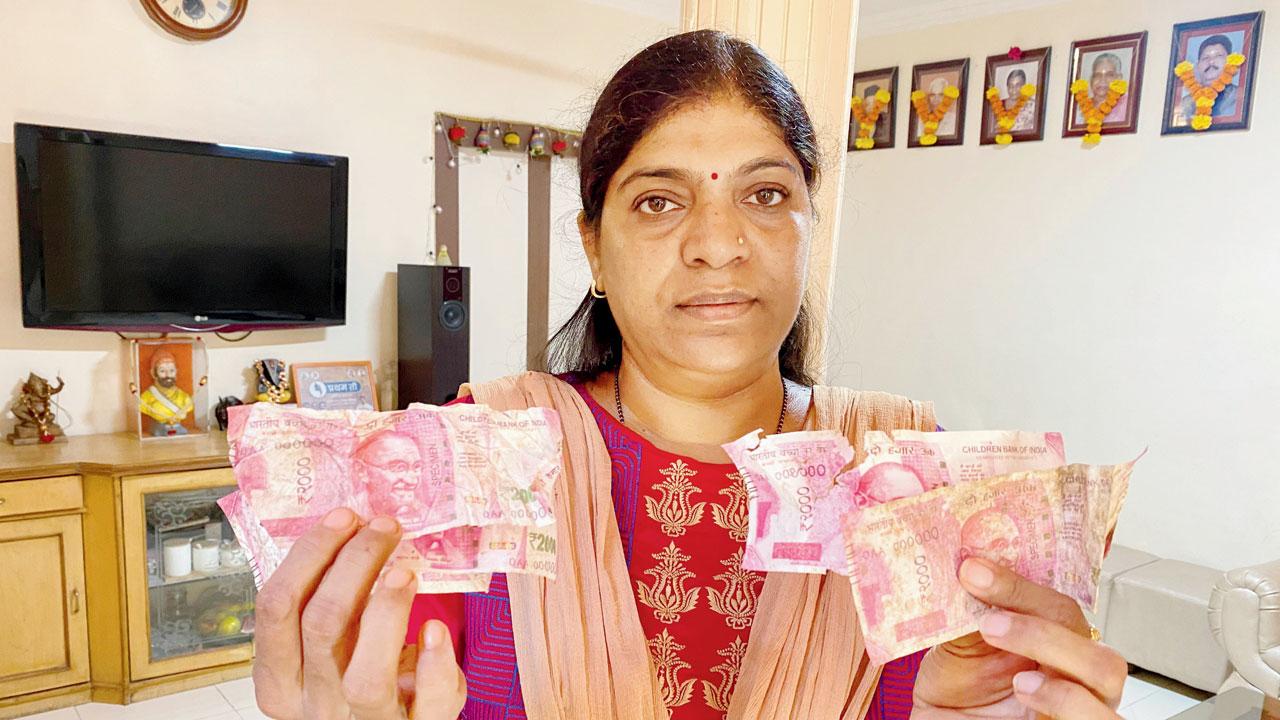 Former Shiv Sena corporator Kiran Chendvankar shows some of the notes she collected from Madhuban