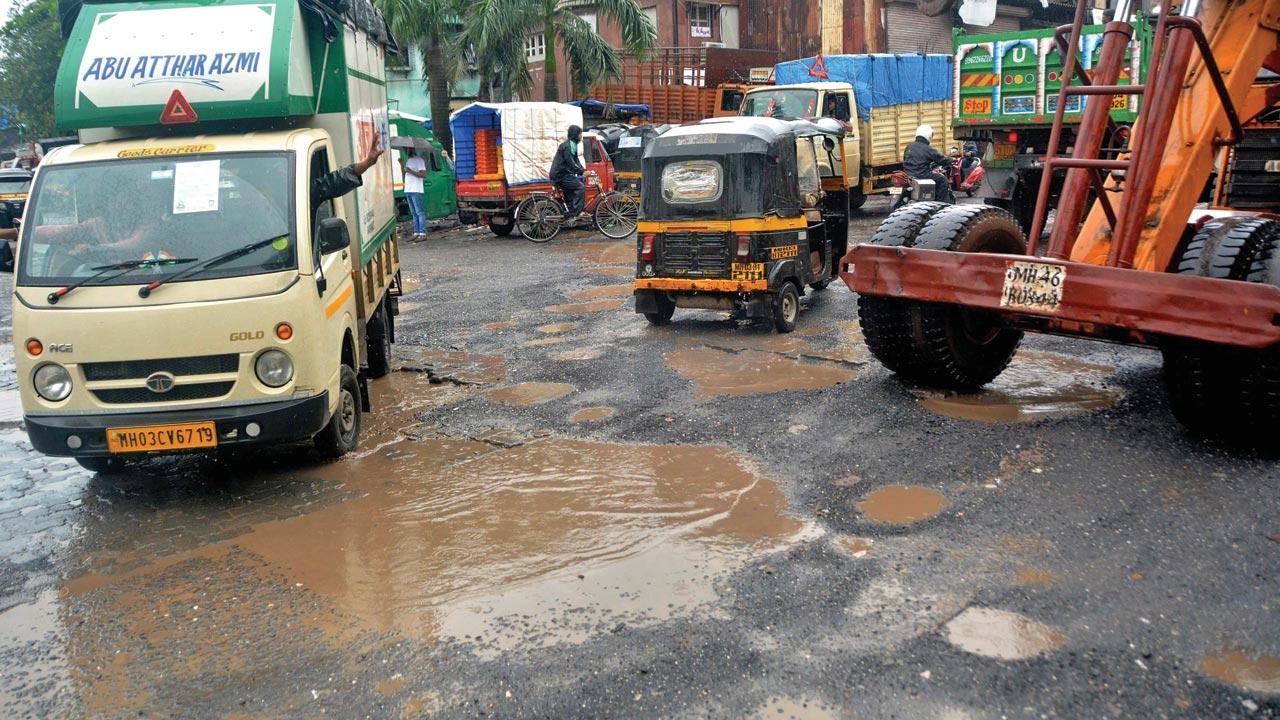 Potholes at Jarimari on Andheri Kurla Road last month