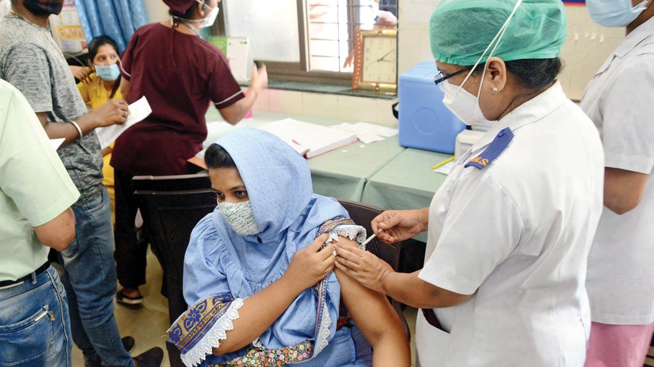 Frontline and healthcare workers get vaccinated at Khan Bahadur Bhabha Hospital in Kurla in May. File pic