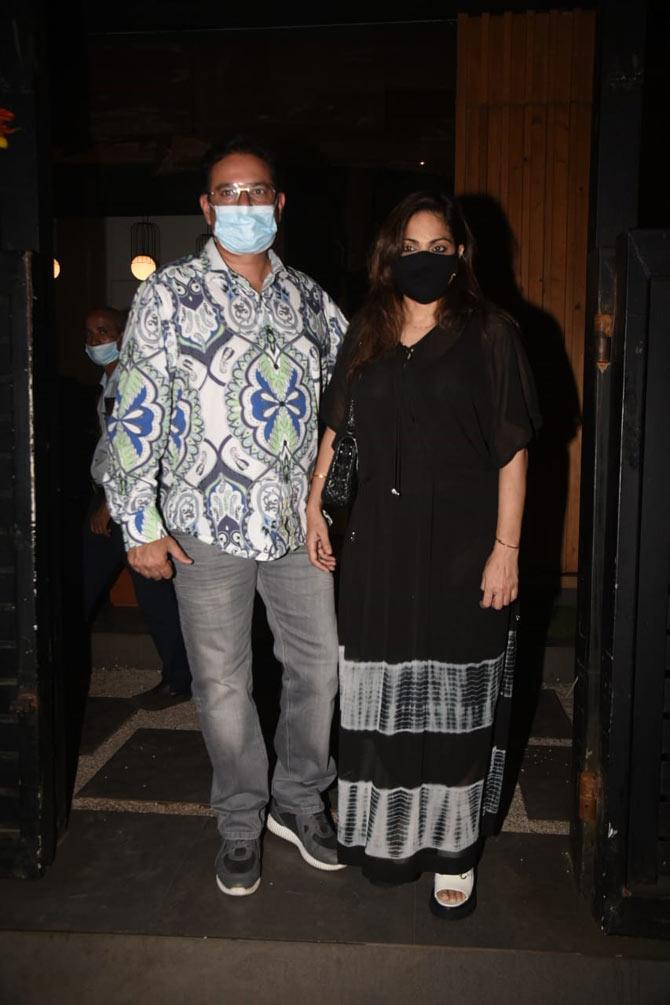 Also spotted at the birthday bash were Atul Agnihotri and wife Alvira Khan Agnihotri, who looked unrecognisable due to their masks. Atul opted for a printed shirt and jeans, while Alvira looked pretty in a black maxi dress.