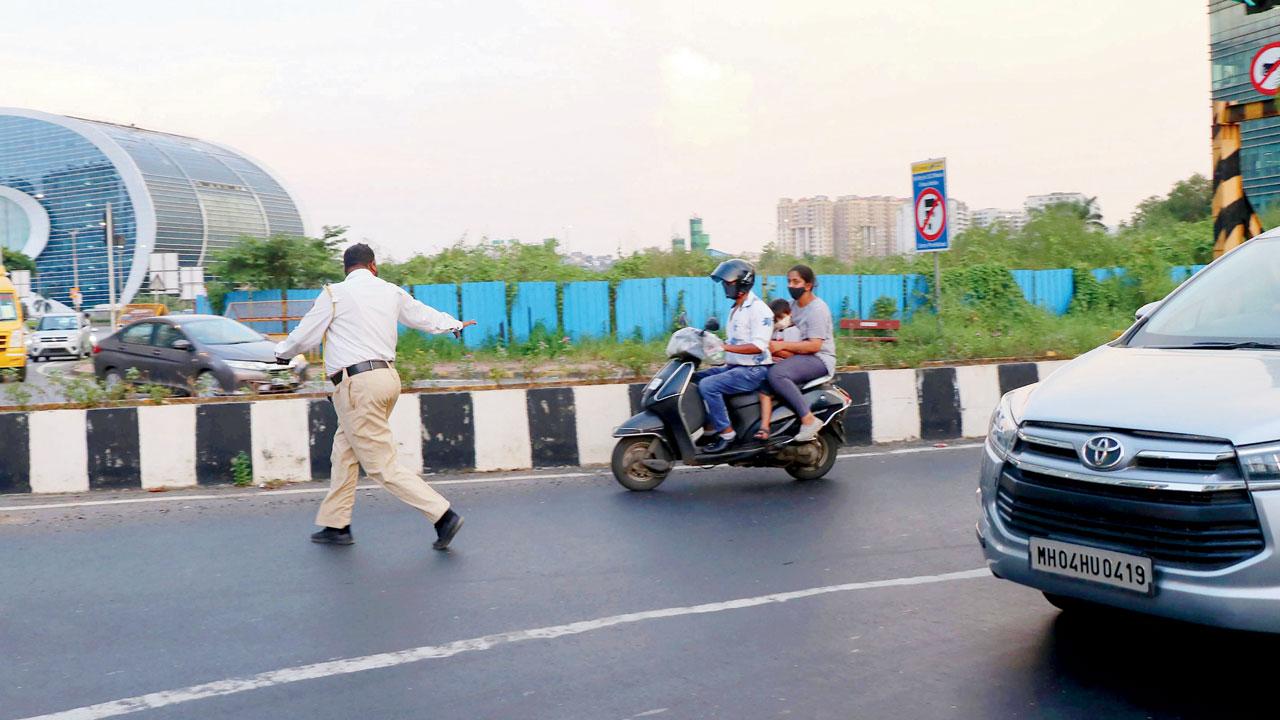 A biker on the Eastern Freeway, near Deonar circle, on Monday