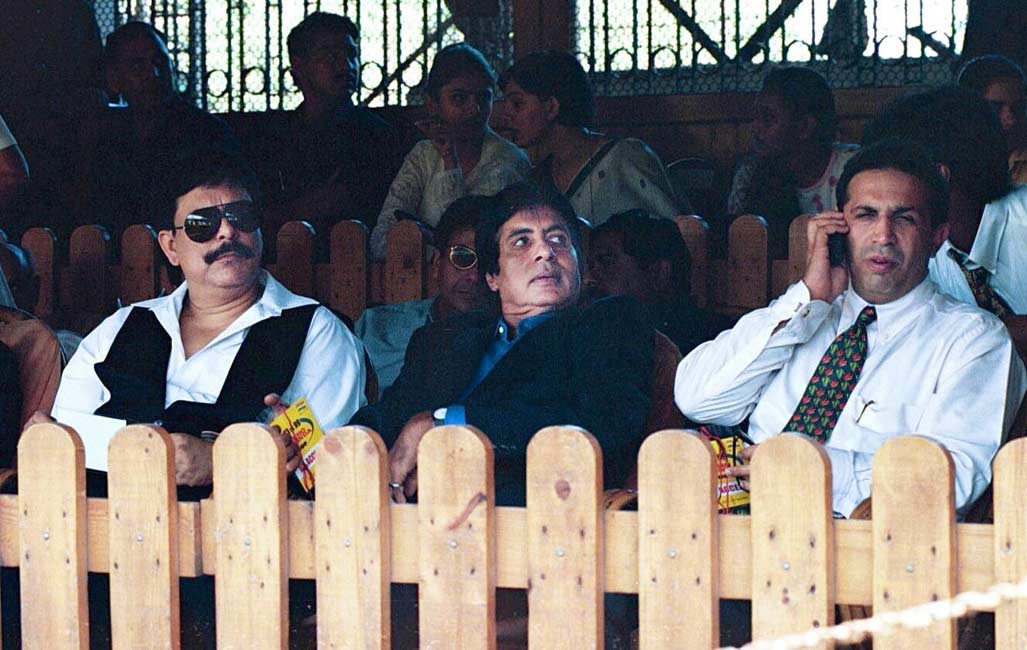 Amitabh Bachchan and industrialist Parvez Damania at Mumbai's Wankhede stadium watching a limited-overs cricket match played between the 1983 World Cup-winning team and 1999 World Cup team.