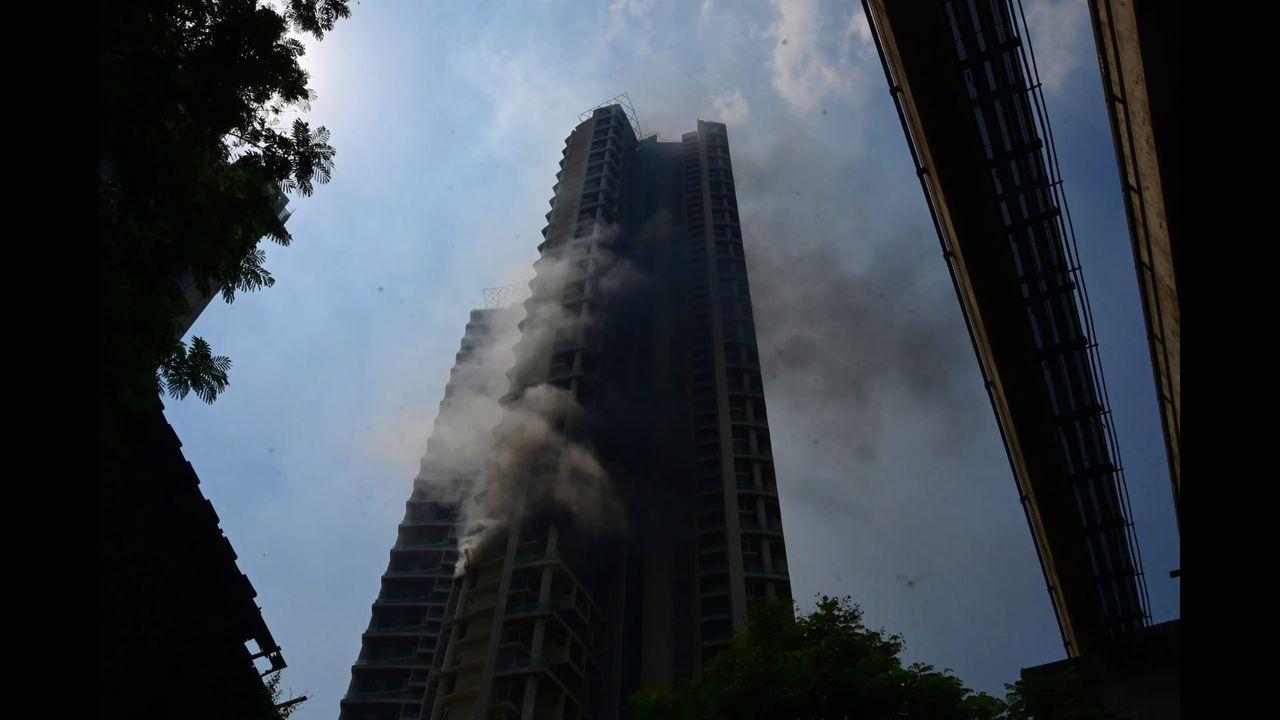 The blaze erupted on the 19th floor of the One Avighna Park building on Currey Road shortly before noon. Pic/Bipin Kokate