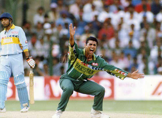 Pakistan pacer Waqar Younis appeals for a wicket with Ajay Jadeja in the background