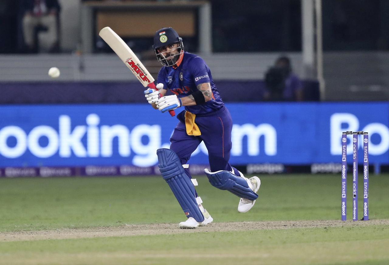 Virat Kohli celebrates after scoring his half-century (50 runs) during the ICC men’s Twenty20 World Cup cricket match between India and Pakistan