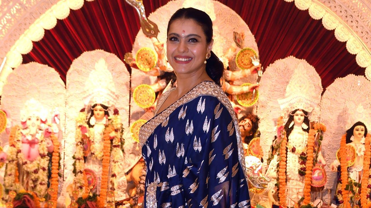 Photo Inside: Kajol looked stunning in a green organza saree on Maha Navami