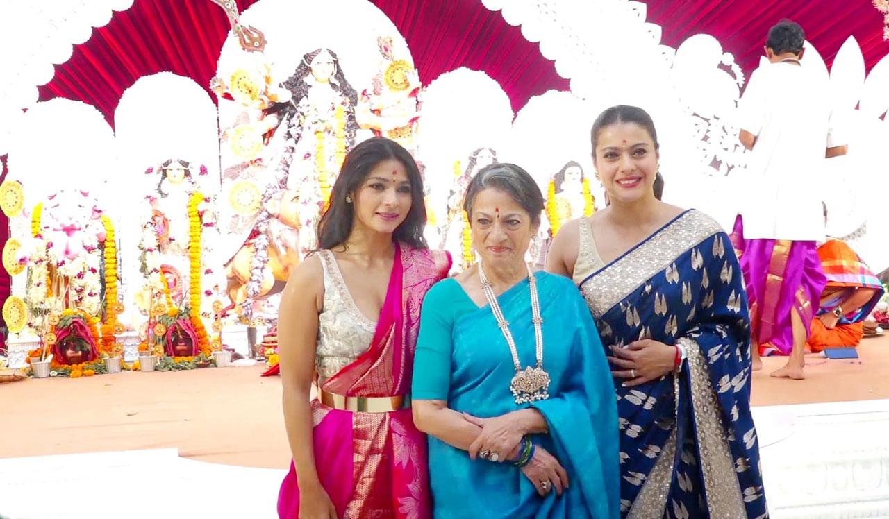 The mother-daughters trio looked resplendent as they posed together for the paparazzi at the Sarbojanik Durga Pooja Pandal. Tanishaa Mukerji, Tanuja and Kajol prayed to goddess Durga on Maha Ashtami day of the Navratri festival. (Pic: Yogen Shah)